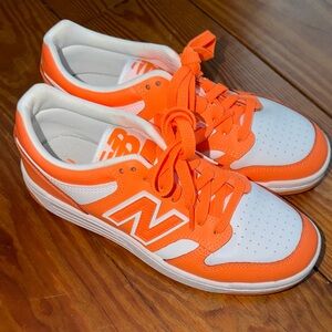 New Balance Bright Orange and White Athletic Shoes